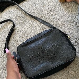 Black Kate spade cross body, gently used small sized bag, leather material